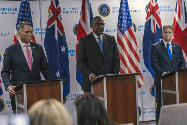 L-R: Deputy Prime Minister and Defence Minister Richard Marles; US Secretary of Defense Lloyd Austin; British Defense Secretary Grant Shapps, speak with reporters on the Australia-United Kingdom-United States Security Partnership, 1 December 2023. 
Credit: Department of Defense