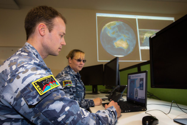 Leading Aircraftwoman Nerissa Walpole and Leading Aircraftman Rob Patterson discuss space debris patterns.
Defence