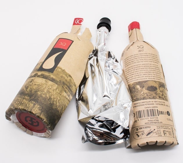 The Frugal Bottle is split into its paper and plastic components for recycling.