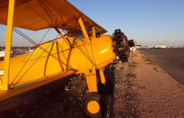 Bright and early: this classic biplane greets the Sunraysia dawn. (Tony Self)