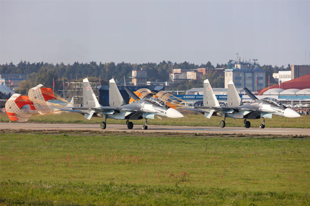 Two Su 30s on the runway at MAKS. (Phil Hosking)