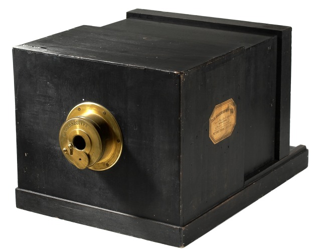 The image shows the Susse Fr&egrave;res Daguerreotype camera from 1839, in exhibition in the Westlicht Photography Museum in Vienna, Austria. Two months before the public announce at the French Academy of Arts and Science of the process of Daguerreotype, Jacques Louis Mand&eacute; Daguerre signed a contract with his relative Alphonse Giroux and with the Maison Susse Fr&egrave;res to produce the cameras according to his instructions. Both cameras used the same lens produce by the Maison Charles Chevalier a lens f15 380 mm.