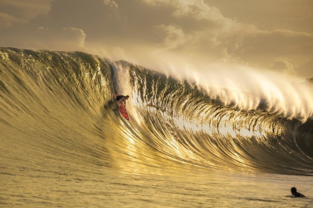 &copy; Ted Grambeau. Gold Nias. A golden moment as big wave surfer Mark Healey takes the drop on his 7'6" quiver. Surfing one of the biggest swells to ever hit Nias Island, off Sumatra in Indonesia.