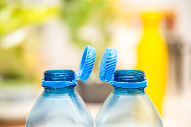 Beverage producers in major markets are adopting tethered caps to ensure lids and bottles are recycled together. Image: Getty