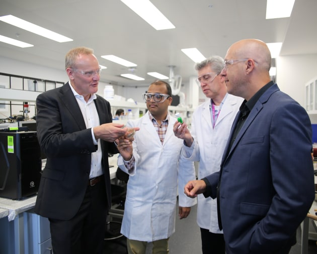 The Arnott's Group and UNSW School of Chemical Engineering researchers viewing Paco Industries' solvent.