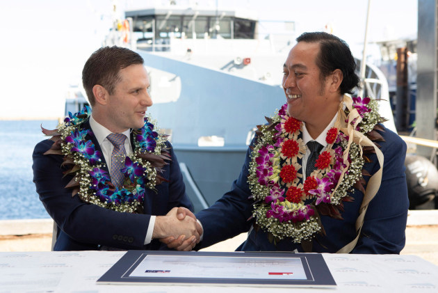 Assistant Minister for Defence Alex Hawke co-signs the handover certificate with Crown Prince Tupouto&rsquo;a &lsquo;Ulukalala.
Defence