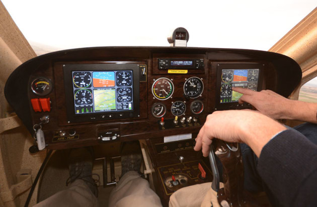 The wood grain fascia adds a touch of class to a very functional instrument panel. (Steve Hitchen)