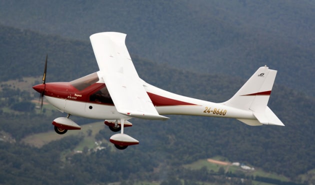 The glider heritage of the Ekolot Topaz is evident in the wing profile.