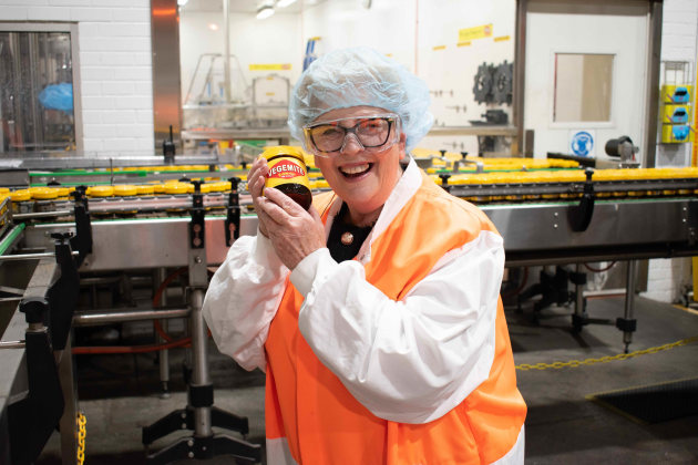 As Vegemite turns 100, one of the original Happy Little Vegemites from its first TV commercial, Trish Cavanagh, was given a tour of the Vegemite factory, which has been on the same site since the first jar rolled off the line.