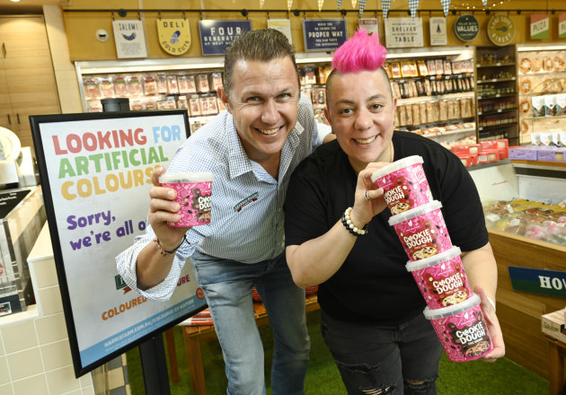 Tristan Harris and pastry chef, Anna Polyviou announcing that Harris Farm Markets stores are now free of all artificial flavours on shelves. Image: Adam Hollingworth