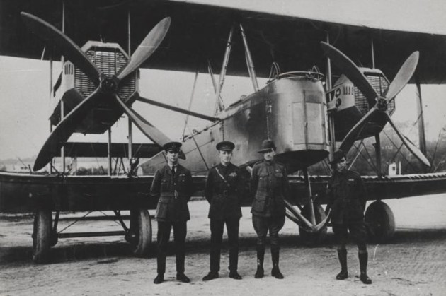 Keith and Ross Smith with other crew members stand before their Vickers Vimy. AHSA NSW plans to recreate the Australian sectors of their historic flight. (John Furlong / State Library of South Australia)