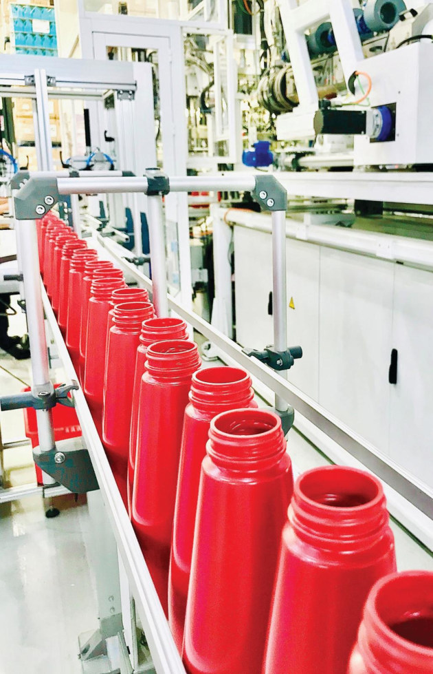 Wellman&rsquo;s production line for the 100% recycled, food grade PE squeezy sauce bottle.
