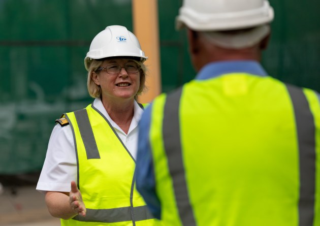 Rear Admiral Wendy Malcolm is given a guided tour of the Tropical Reef Shipyard in Cairns by General Manager Rob Downing. (Defence)