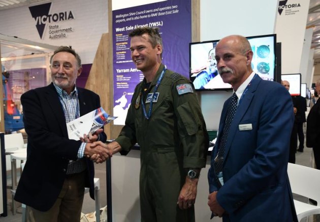 Left to Right: Wellington Shire Mayor Alan Hall, Wing Commander James Atkinson from the RAAF's Central Flying School and Federation Training's Roger Mason at the announcement of West Sale partnerships at the Australian International Airshow. (Steve Hitchen)