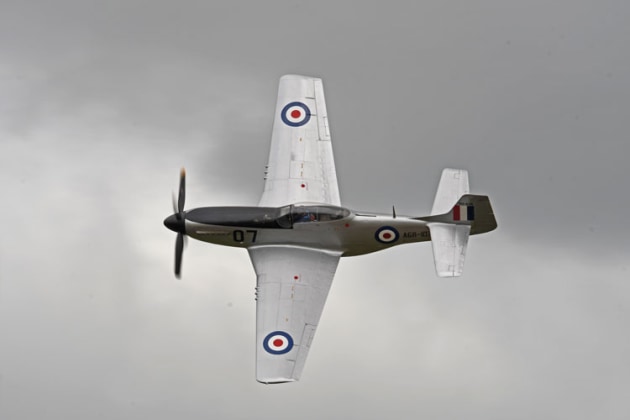 Paul Bennet was a busy man, flying with the Sky Aces, solo in his Wolf Pitts and at the stick of several warbirds including Ross Pay's Mustang. (Steve Hitchen)