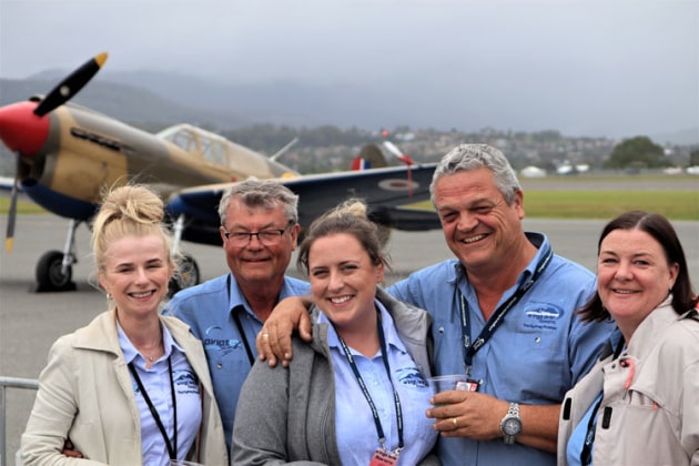 They did it! The primary organisers of Wings Over Illawarra 2021 relax towards the end of the show. L-R: Event Administrator Clara Pawelski, Ground Operations Manager Bob Bertram, Event Manager Lucy Mellor, WOI kingpin Mark Bright and Event Project Co-ordinator Jan Sinclair. (Angela Stevenson)