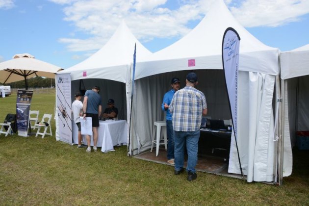 The GA exhibitor tents were set up on the closed runway. (Steve Hitchen)