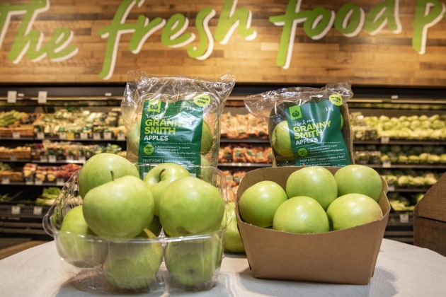 Woolworths has moved from plastic to cardboard trays for fruit and vegetables.