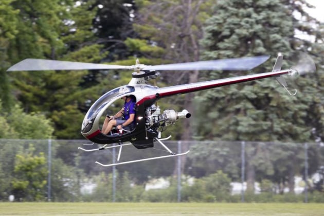 A Mosquito Helicopters XET passes in front of the camera spot. (Philip Hosking)
