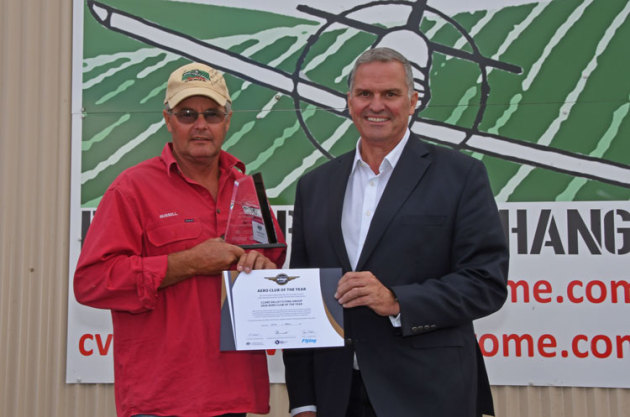 CVFG chairman Russell Schmidt receives the 2020 Aero Club of the Year award from CASA's Rob Walker. (Steve Hitchen)