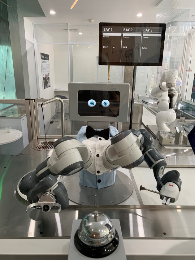 ABB's Yumi robot, named Tony in the Niska store, adds toppings to the ice cream bowls.