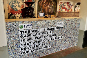 Waste cartons become coffee shop walls