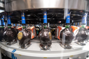 Automatic labeller gives hand-wrapped look 