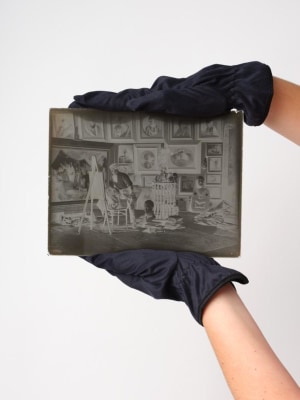 Auction house suggests destruction of originals as historic glass plate photos sold as NFTs