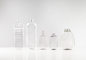 A stretch blow moulder for oval bottles 