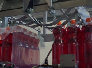 Accessible shrink wrapping solution for low speed lines