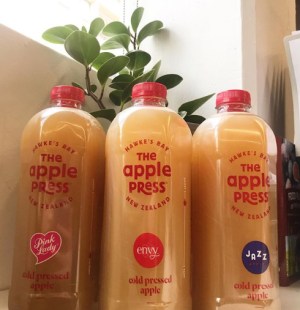 Cold-pressed apple juice crosses the ditch