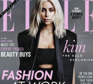 Bauer suspends some magazines, cuts jobs