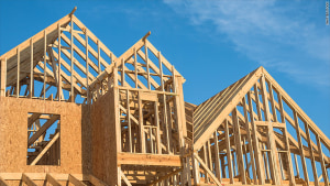 Building to improve thermal efficiency and to reduce emissions 