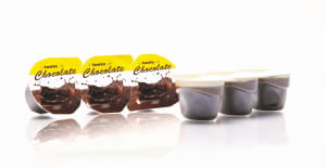 Entry level thermoformer for portion packs