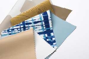  KODAK OPENS TEXTILES TEST FACILITY