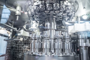 Proprietary can seamer handles up to 135,000 containers per hour