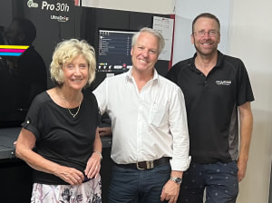 KUHN ACQUIRES REGAL SIGNS & DESIGNS