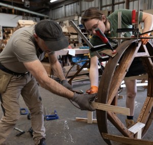 Community wood sculpture shown in Newcastle CBD