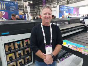 PRINTERS BUYING AT VISUAL IMPACT